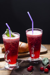 mousse cherry drink on a dark background