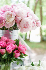 Lovely flowers in glass vase. Beautiful bouquet of pink peonies . Floral composition, scene, daylight. Wallpaper