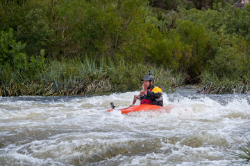 Fototapeta na wymiar White water kayaking in Du Toits Kloof, South Africa