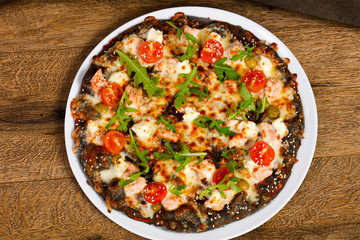 Pizza with salmon and mozzarella