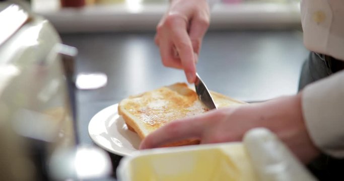 Spreading Butter on Toast
