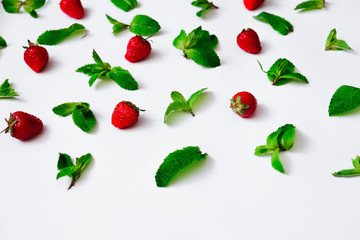 Strawberries and fresh mint on white background,  berry pattern