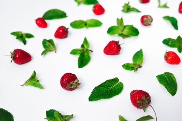 Strawberries and fresh mint on white background,  berry pattern