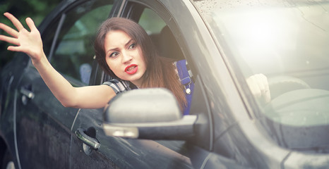 Girl driving a car bad emotions