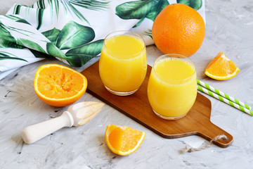 Fresh Orange Juice in the Glass Summer Morning Drink Beverage Gray Background Vitamins