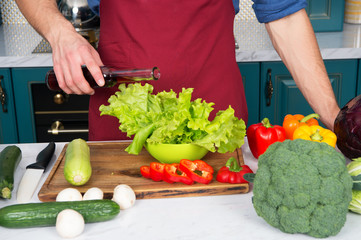 Measure accurately. Nothing wrecks dish like a double portion of vinegar or oil. Hands of chef male...