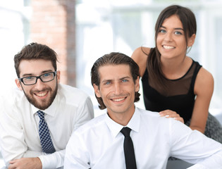 young business colleagues in the background of the office