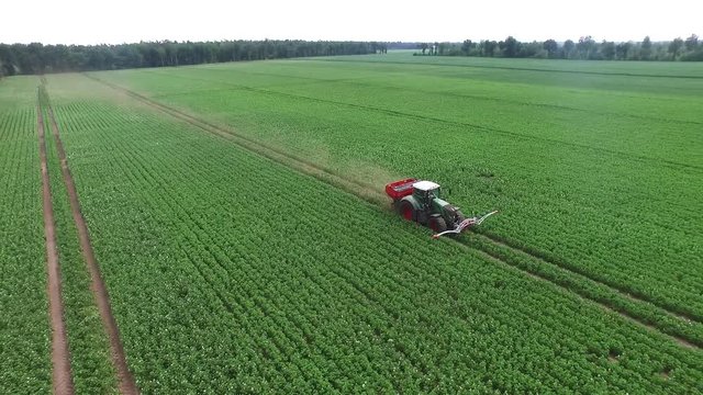 Tractor in scenic farmland, aerial