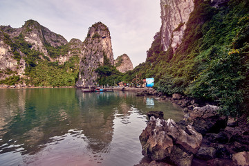 Ha Long Bay , Vietnam-29 November 2014:Ha Long Bay , Vietnam-29 November 2014:  Hang Sung Sot cave harbour and tourists who visited the Hang Sung Sot  cave,UNESCO World Heritage Site