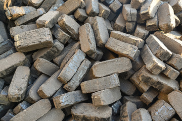 Heap of peat briquettes, alternative fuels, raw material, manufacturing 