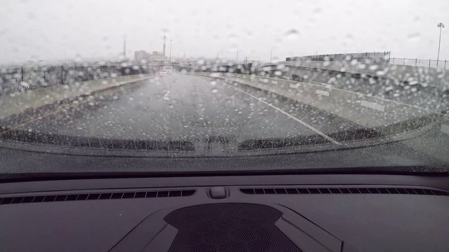 POV drive on highway in rain