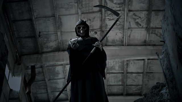 death with a scythe shows the middle finger