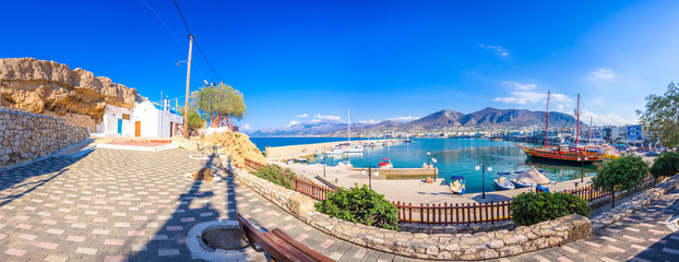 The harbor of the famous resort Chersonissos, Crete, Greece  - obrazy, fototapety, plakaty