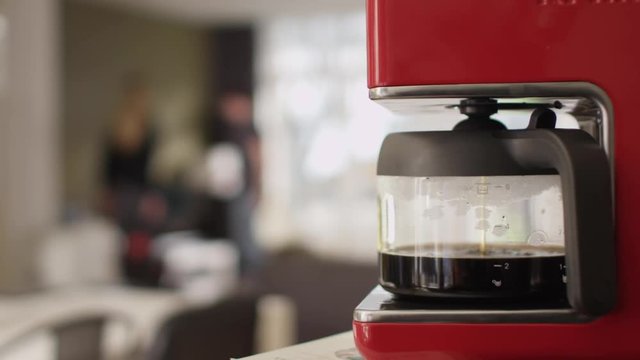 Soft focus, coffee maker in apartment