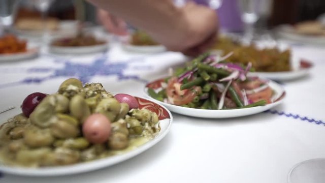 close up, man put down traditional food Morocco