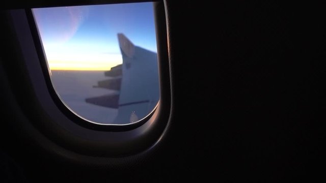 POV, view of wing from plane window