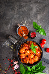 Meatballs. Meatballs in tomato sauce with carrot and onion