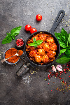 Meatballs. Meatballs in tomato sauce with carrot and onion