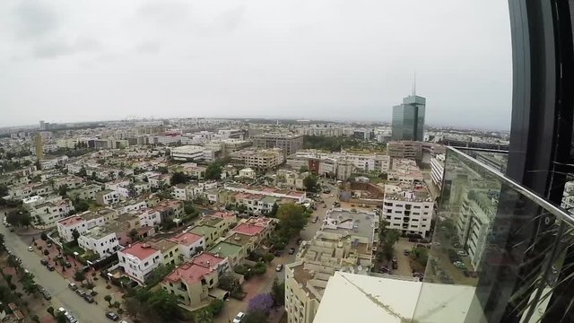 Pan right, view of city in Morocco