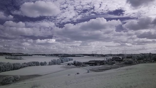 infrared photography - ir video clip of landscape under sky with clouds - the art of our world in the infrared spectrum