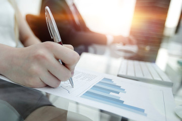 business woman working with financial documents.