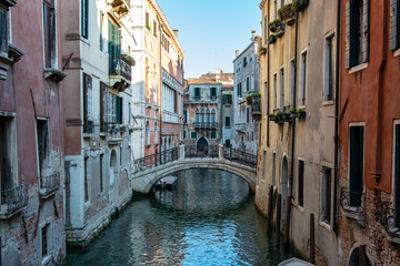 Fototapeta na wymiar Bridge over channel in Venice Italy 