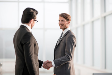friendly handshake of business partners
