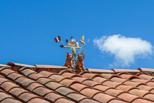 Torito de Pucara Rooftop Ornaments of Cows and Flowers in Sacred Valley, Peru