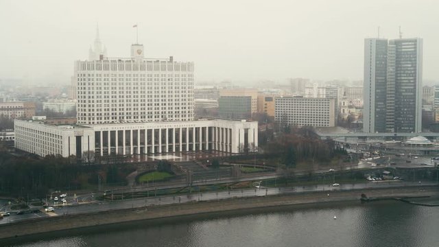 The House of the Government of the Russian Federation. Cars and skyscrapers. Arbat skyscraper. Foggy day Moscow. Locked down real time medium shot
