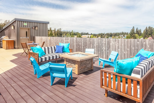 rooftop deck with modern blue patio furniture