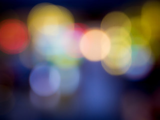 Blurred reflections of colored lights.
