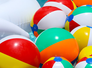 Beach balls in a pool