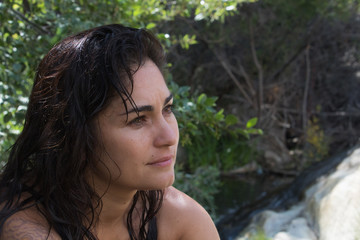 Calm serious confident attractive Spanish America Hispanic Mexican woman in nature