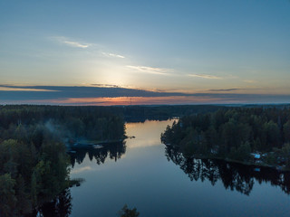 Evening view from the air to the system of lakes with islands 