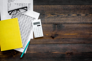 Math homework. Math textbook or tutorial near sheet with numbers, countes, calculator, notebook...