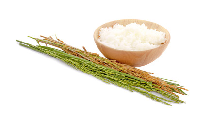 white rice (Thai Jasmine rice) in wooden bowl and unmilled rice isolated on white background