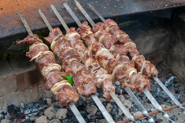 Meat on a stick over charcoal, barbecue, shashlik, kebab cooking
