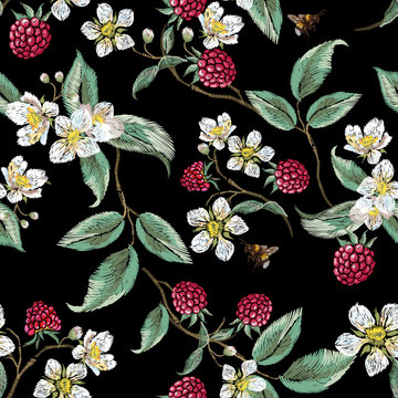 Embroidery floral pattern with aspberries and bee. Vector embroidered patch with flowers for wearing design.