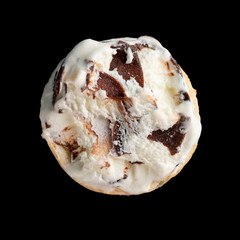 top view ice cream cone with some bites on a black background close up