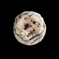 top view ice cream cone with some bites on a black background close up
