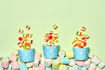 Birthday Concept - Holiday Top View Various Sweet Candy on White Background. Fun Decoration. Minimal Holiday Concept. Flat Lay