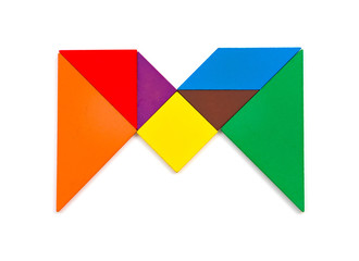 tangram shaped like a letter M on white background