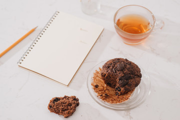 Breakfast with fresh homemade delicious muffins and tea.