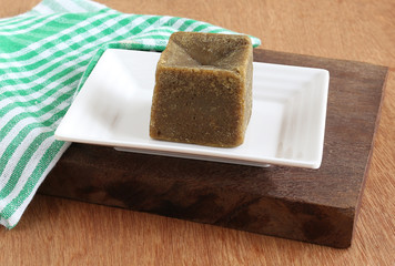 Organic jaggery, which is an unrefined sugar, is a healthy food that is made from sugarcane juice, without using any chemicals, and that is used as a sweetener in many Indian dishes.