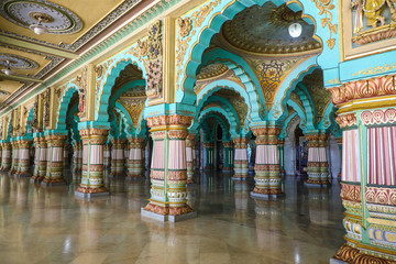 Fototapeta na wymiar A grand palace of Mysore from Indian state of Karnataka boosting beautiful old architecture in arches and big walkways