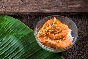 Rice with shrimp on banana leaves. food
