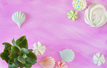 Flat lay minimal summer meringue dessert and succulents on violet pastel background with copy space
