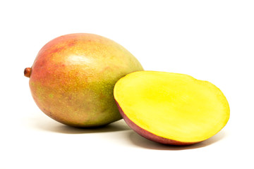 Macro of mangoes isolated on white backround. Half cut mango