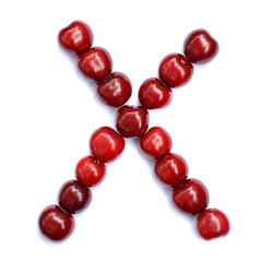 Letter X made with cherries to form a letter of the alphabet. Berry letters on a white background.