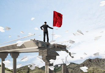 Man with flag presenting leadership concept.